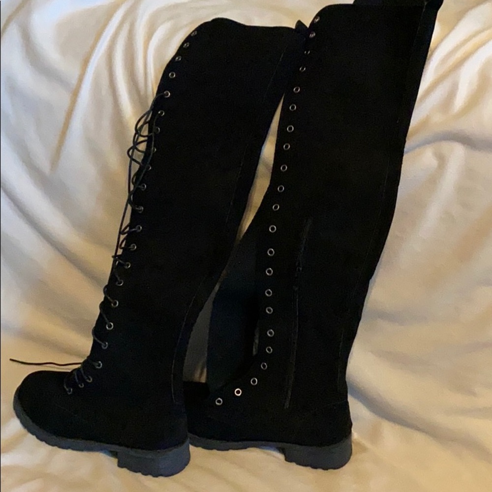 Over the knee lace up boots